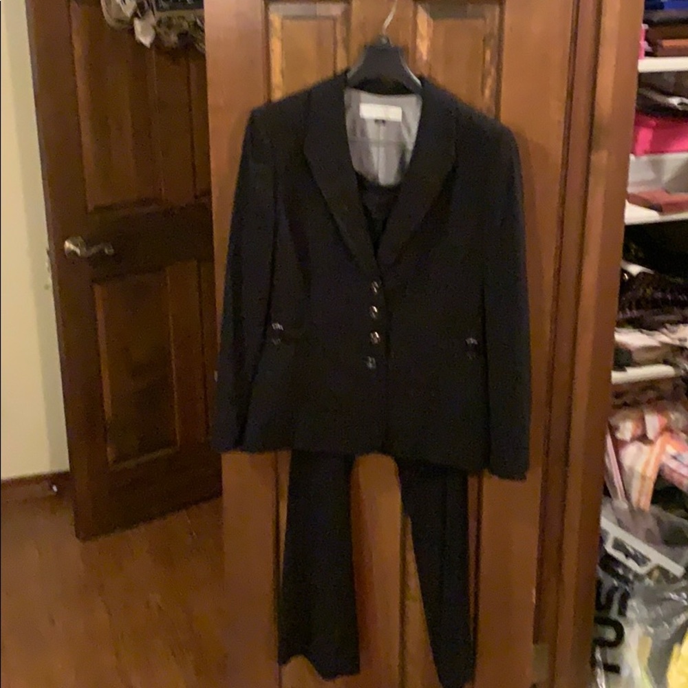 Tamarind pinstripe two piece suit.Never worn.